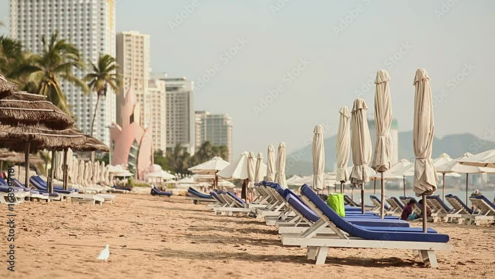 Exotic beach with sun loungers. Vietnam. The city of Nha Trang. Exotic beach with sun loungers. Vietnam. The city of Nha Trang.