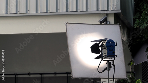 Big studio lighting with tripod for video production.