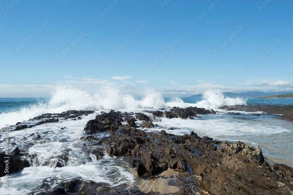 Atlantic ocean waves hitting the rocks in Galicia