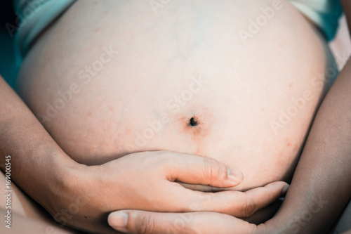 Pregnant woman's belly.