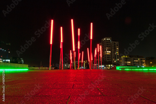 Red lightning posts in docklands at night. Dublin, Ireland.
 photo