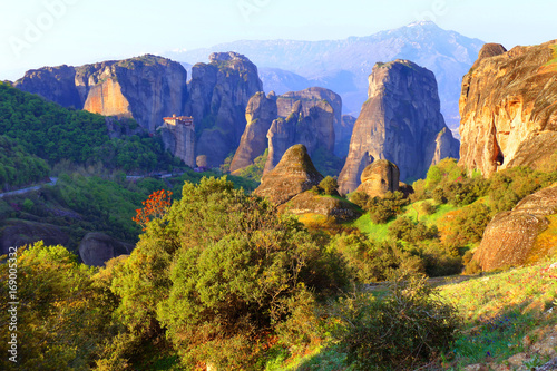 Greece, Meteora - a natural phenomenon of rocks resembling stone columns reaching 400 meters. At the peaks there are 9 Christian monasteries.