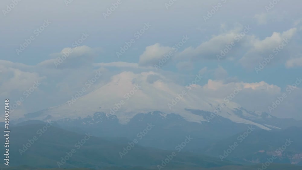 Russia, Republic of Kabardino-Balkaria, time lapse. Summer in the mountains of the Caucasus. Formation and movement of clouds over mountains peaks. Russia, Republic of Kabardino-Balkaria, time lapse. Summer in the mountains of the Caucasus. Formation and movement of clouds over mountains peaks.