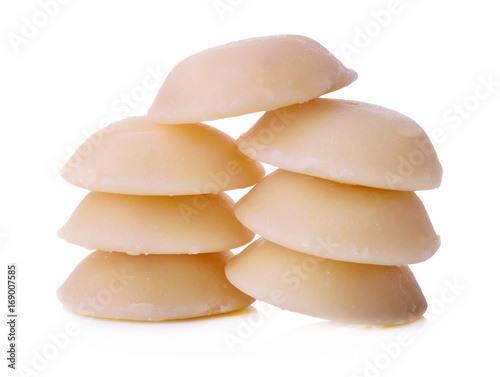 Schilderij op canvas sliced palm sugar isolated on white background.