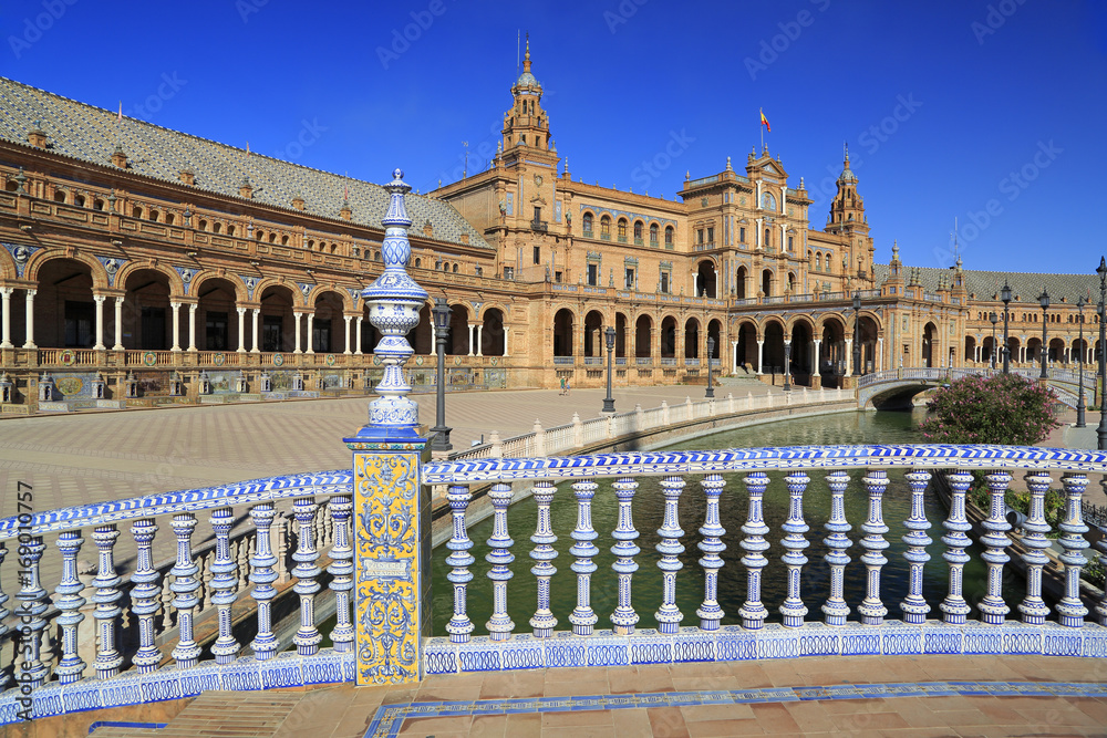 Fototapeta premium Plaza de Espana or Spain Square in Seville, Andalusia, Spain. Traditional bridge detail