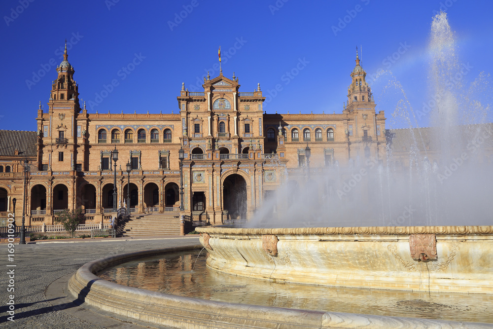 The fountain in  Plaza de Espana or  Spain Square in Seville, Andalusia, Spain