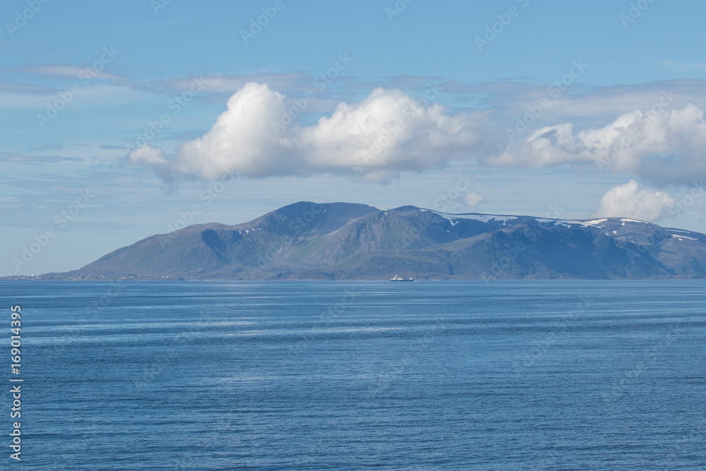 Beautiful mountains at Soroya island in Finnmark county in northern Norway. Beautiful mountains at Soroya island in Finnmark county in northern Norway.