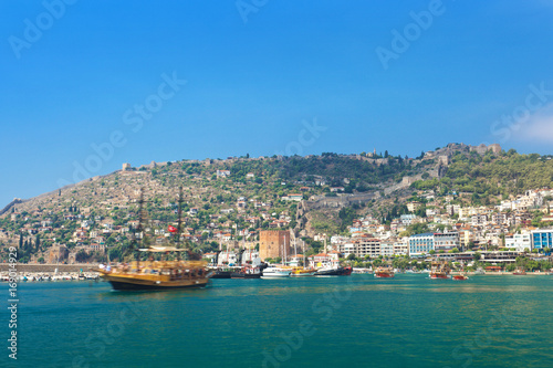Fototapeta Naklejka Na Ścianę i Meble -  Tourist boat in Alanya harbor. Alanya, Turkey
