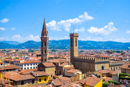 Aerial view over the historical medieval  buildings including the tower of Badia Fiorentina church and Bargello national museum in the old town of  Florence, Italy photo
