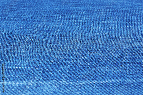 Blue denim jeans macro closeup texture pattern wallpaper background.