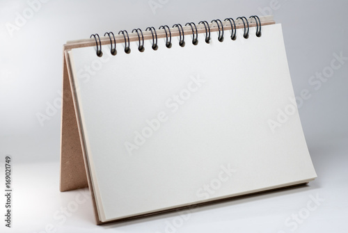 Notebook paper on a white background.