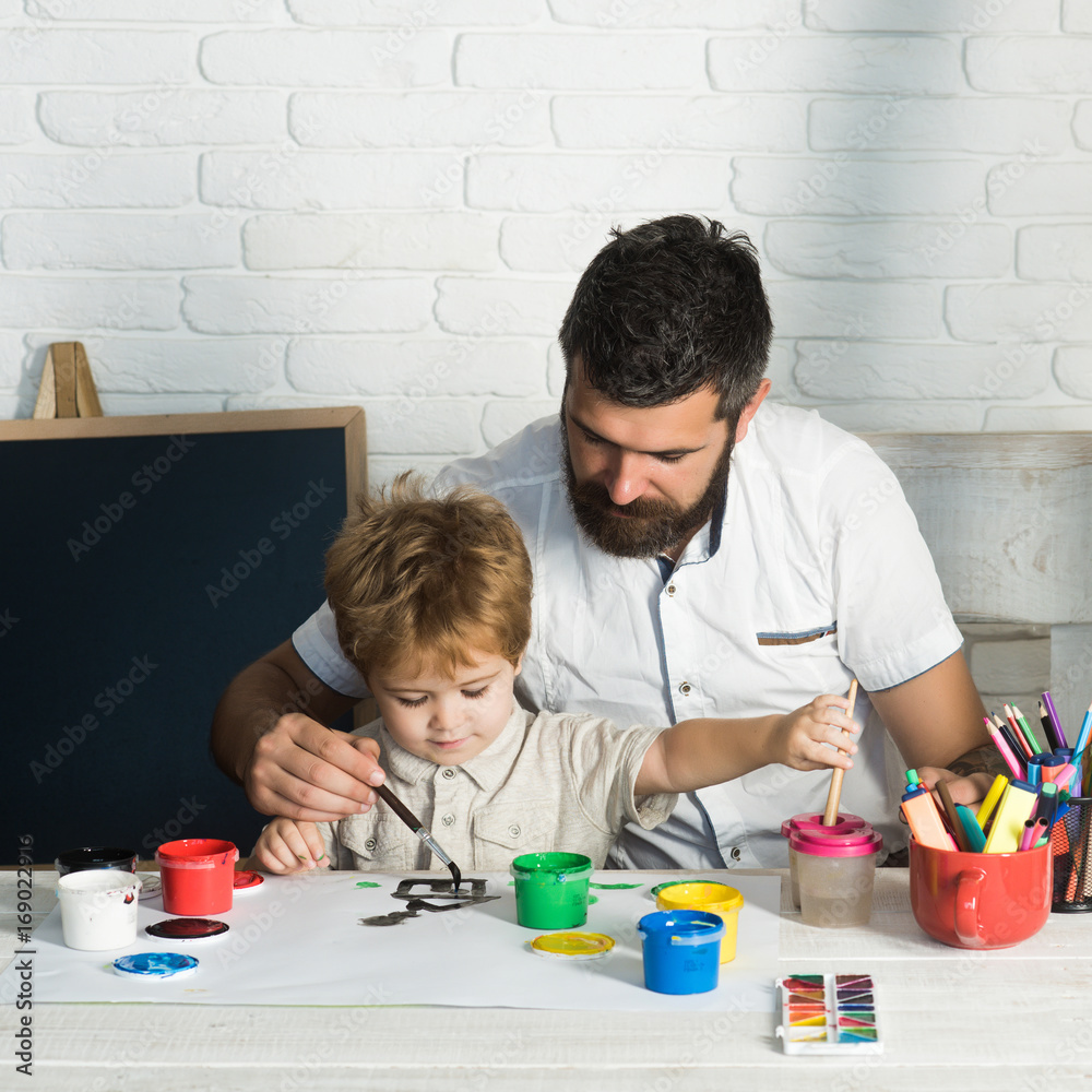 Family house dream. Father and son together paint house of their dreams on paper. Creative creativity. Mortgage for the house, credit for family. Bank credit and loan for housing. Real estate market Family house dream. Father and son together paint house of their dreams on paper. Creative creativity. Mortgage for the house, credit for family. Bank credit and loan for housing. Real estate market