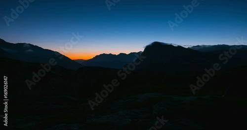 Wallpaper Mural Day to night time lapse from high up on the Alps. Torontodigital.ca