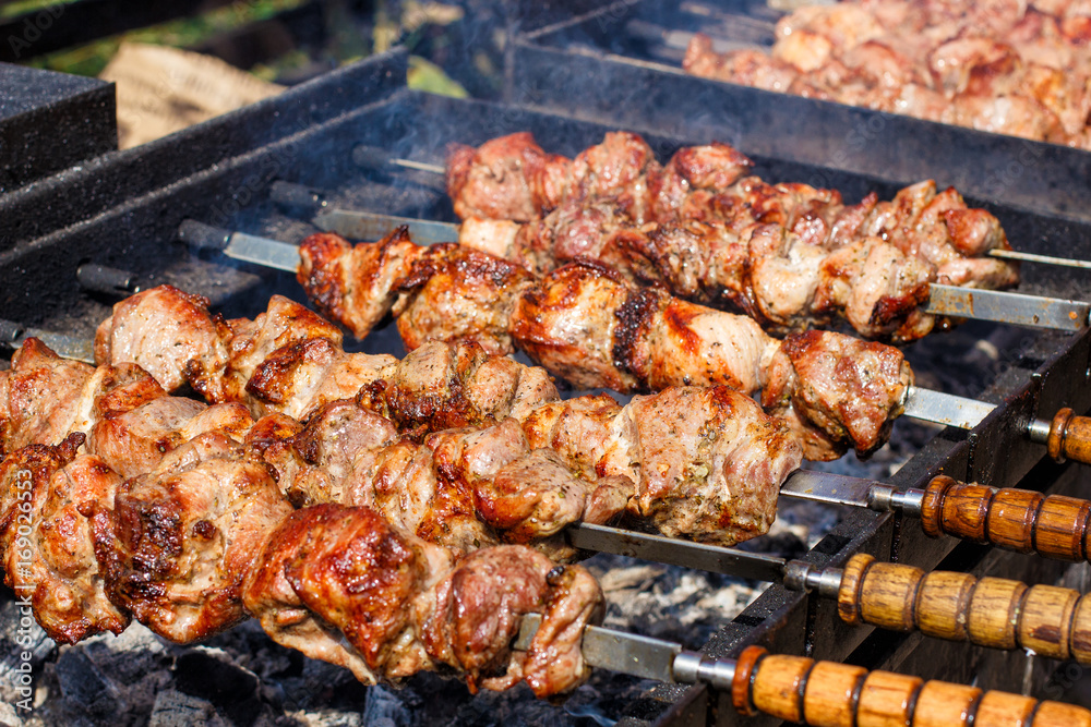 Meat prepared on coals in a barbecue.