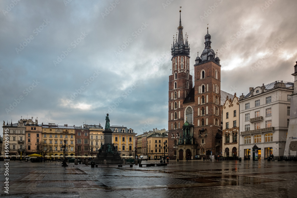 Fototapeta premium St Mary's church on Main Market square in Cracow, Poland
