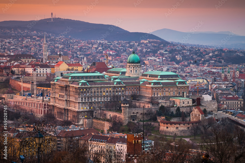 Budapest, Hungary - The beautiful Buda Castle at sunset with the Buda Hills at background