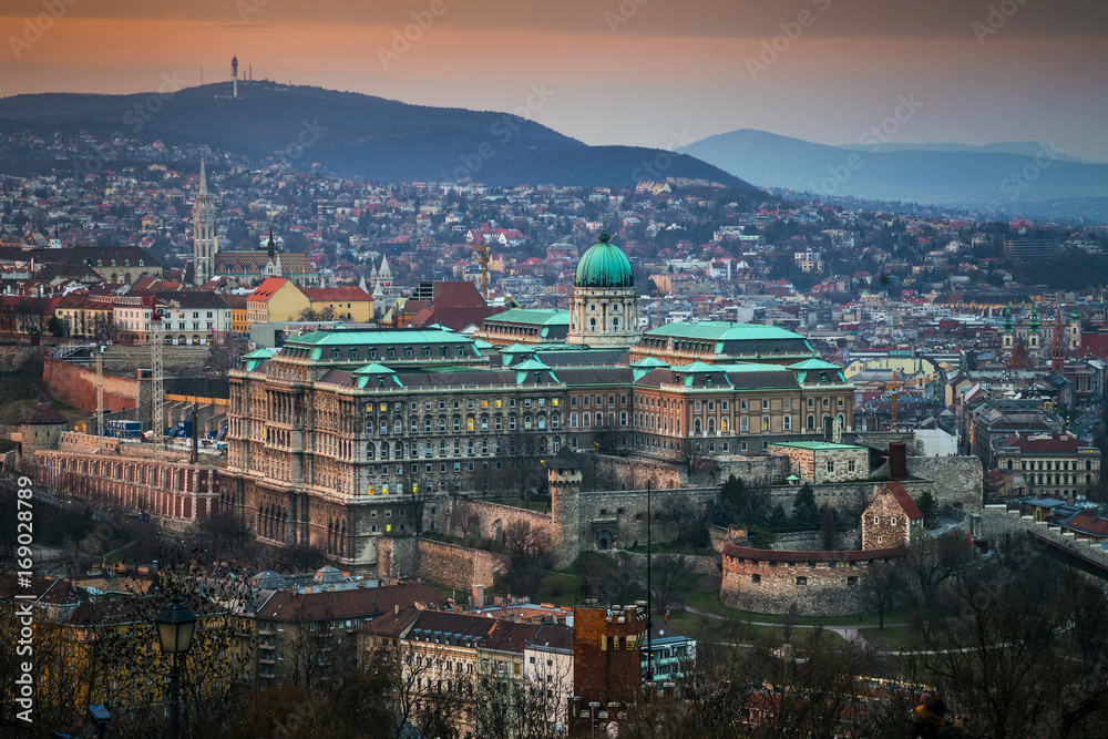 Fototapeta premium Budapest, Hungary - The beautiful Buda Castle at sunset with the Buda Hills at background