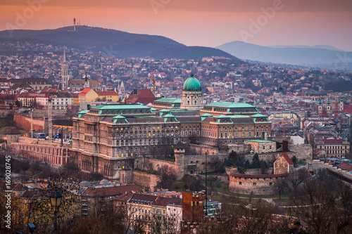 Budapest, Hungary - The beautiful Buda Castle at sunset with the Buda Hills at background