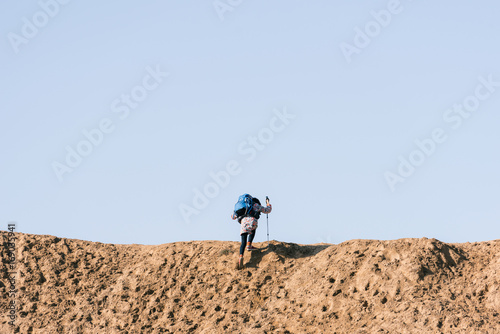 Young girl traveling on a desert photo