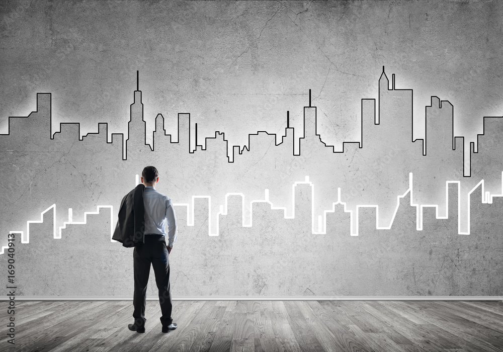 Silhouette of modern cityscape drawn on wall in room Silhouette of modern cityscape drawn on wall in room