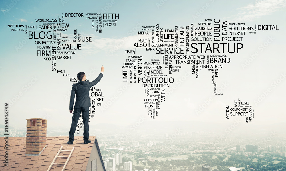 Businessman on brick roof draw world map as concept of globaliza