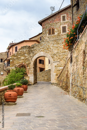 ancient gate (porta pisana, 1326) in the village of Scarlino, tuscany, italy