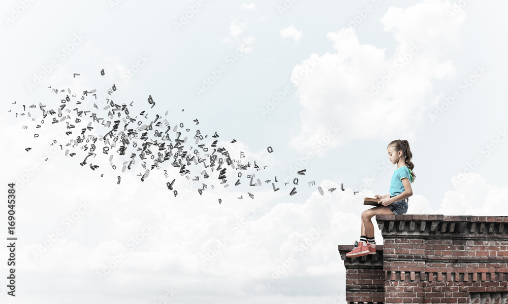 Concept of careless happy childhood with girl exploring this wor Concept of careless happy childhood with girl exploring this wor