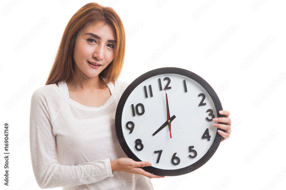 Young Asian woman with a clock. Young Asian woman with a clock.