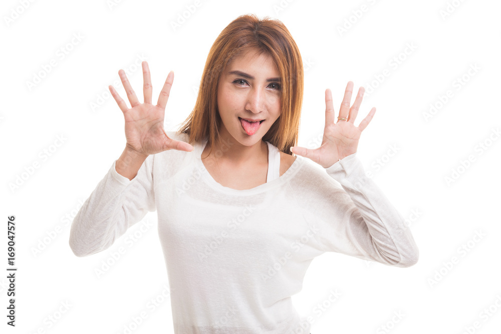 Young Asian woman sticking her tongue out. Young Asian woman sticking her tongue out.