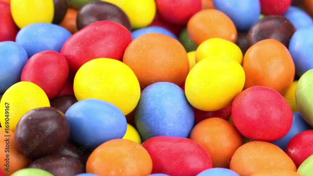 Chocolate Covered Peanuts (rotating on a wooden plate; seamless loopable; 4K) Chocolate Covered Peanuts (rotating on a wooden plate; seamless loopable; 4K)