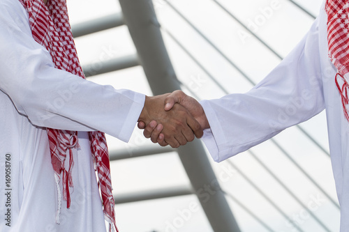 Arab or Muslim handshake photo