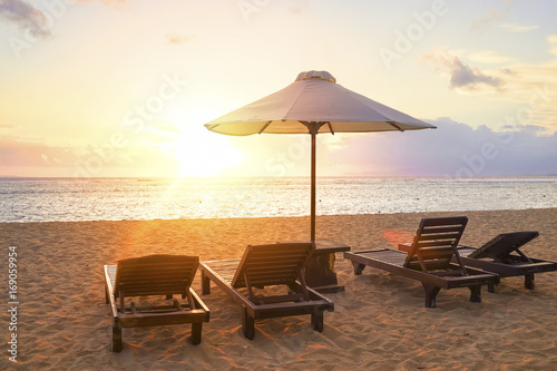 Stunning beautiful sunlight beach with relaxing scenery on a beach. Famous travel destination in Sanur  Bali  Indonesia.