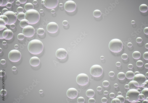 Soap bubbles abstract background with rainbow colored airy foam