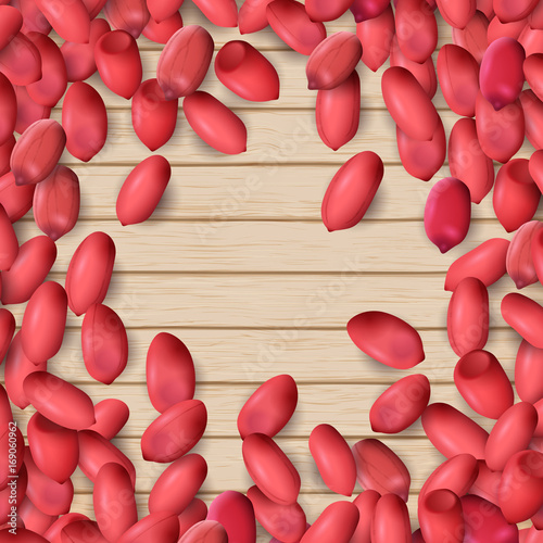Arachis or peanuts background with red scattered nuts and beans