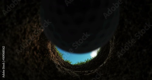 The golf ball gets into the hole, the hole view