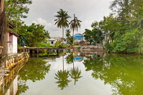Traditional house with river in Thailand