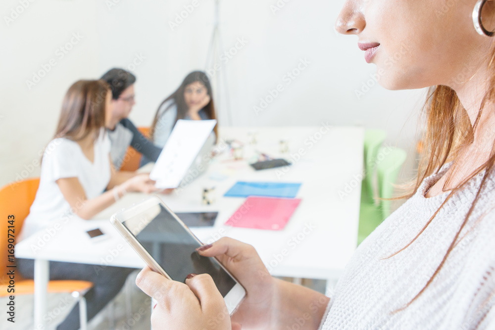 Anonymous female student with tablet Anonymous female student with tablet