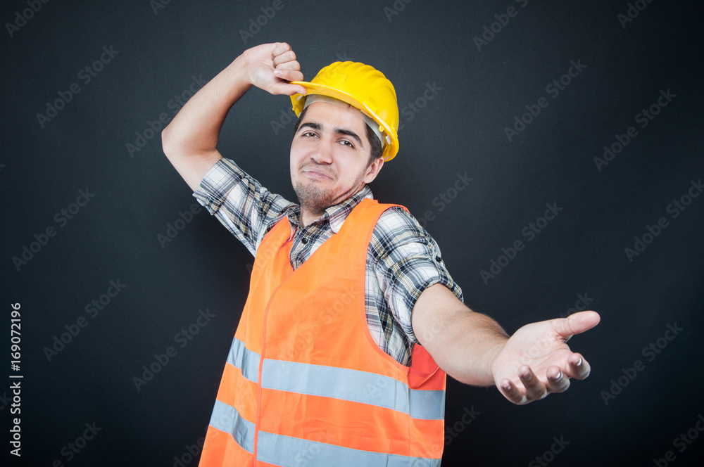 Constructor wearing equipment throwing his hard hat Stock Photo Adobe