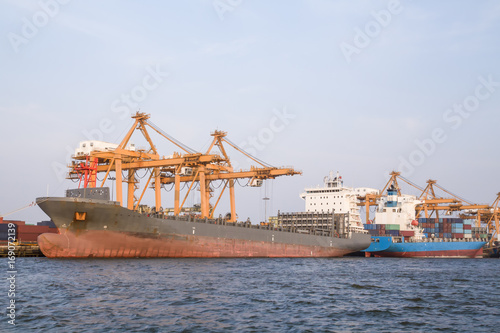 Logistic concept,Container cargo ship docking port for loading containers from the ship.