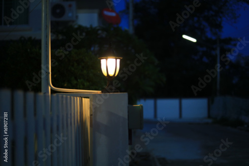 night street in residential house building village suburb , image blur background