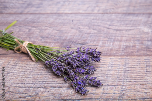 Lavender bunch on the wooden table closeup