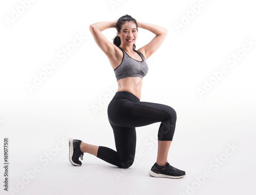 young fitness woman on white background. weight Squat exercise, wellness.healthy and lifestyle concept.