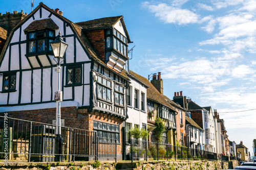 Pretty traditional terrace of Tudor and Georgian houses on a historic high street in Hastings UK