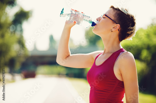 Woman is drinking water