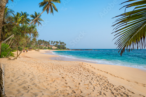 Fototapeta Naklejka Na Ścianę i Meble -  The Amanwella beach in Tangalle in the southern province of Sri Lanka. The coastal town has a majestic bay and the most beautiful beaches in the south and south-east 