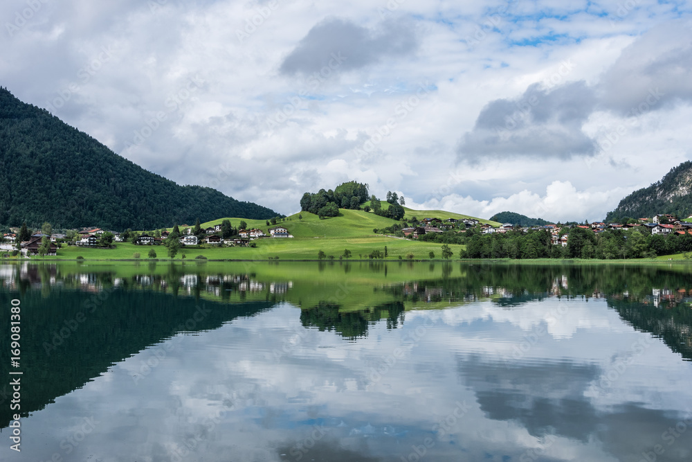 The mountain lake Thiersee in Tyrol, Austria The mountain lake Thiersee in Tyrol, Austria