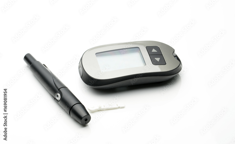 Medical equipment for measuring the level of blood glucose with lancing pen device on white background with copy space Medical equipment for measuring the level of blood glucose with lancing pen device on white background with copy space