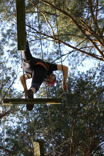  climbing in adventure rope park 