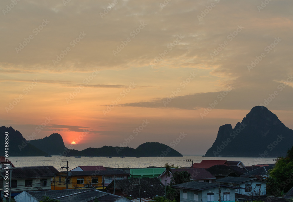 Fototapeta premium Nature background sunset or Sunrise over the mountains stones and the sea