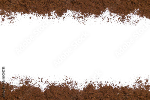 White background with ground coffee on below and above